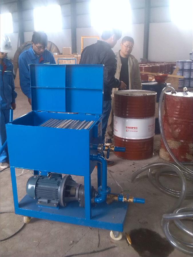 板框濾油機現(xiàn)場照片.jpg 板框濾油機現(xiàn)場照片.jpg